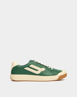 Zapatilla de la colección Tennis en piel verde y blanca